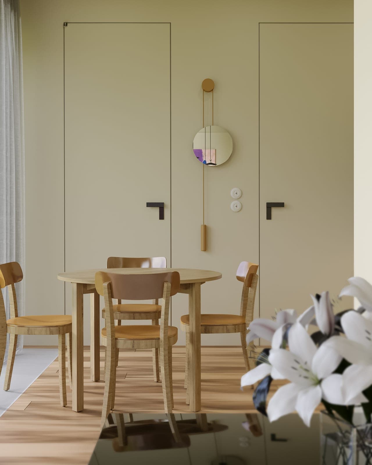 Dining table under sage-green doors