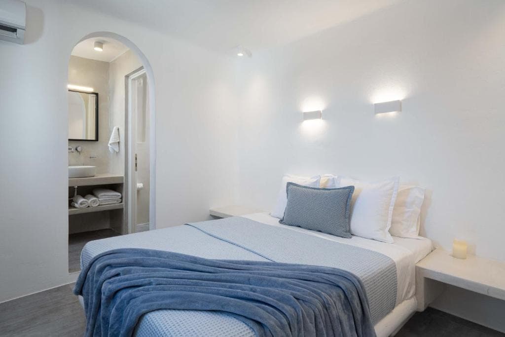 Bedroom with a blue throw
