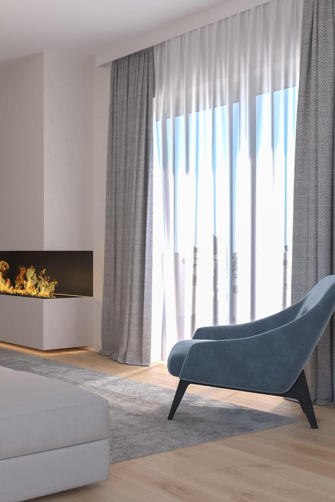 Living room with a blue armchair by the window